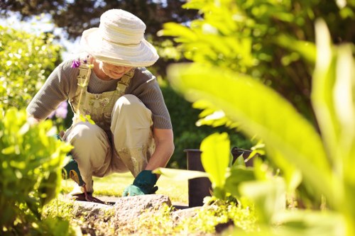 Gardeners in Old Malden improving a local front garden