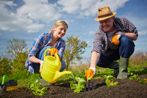 Old Malden gardening team working with safe equipment and protective gear